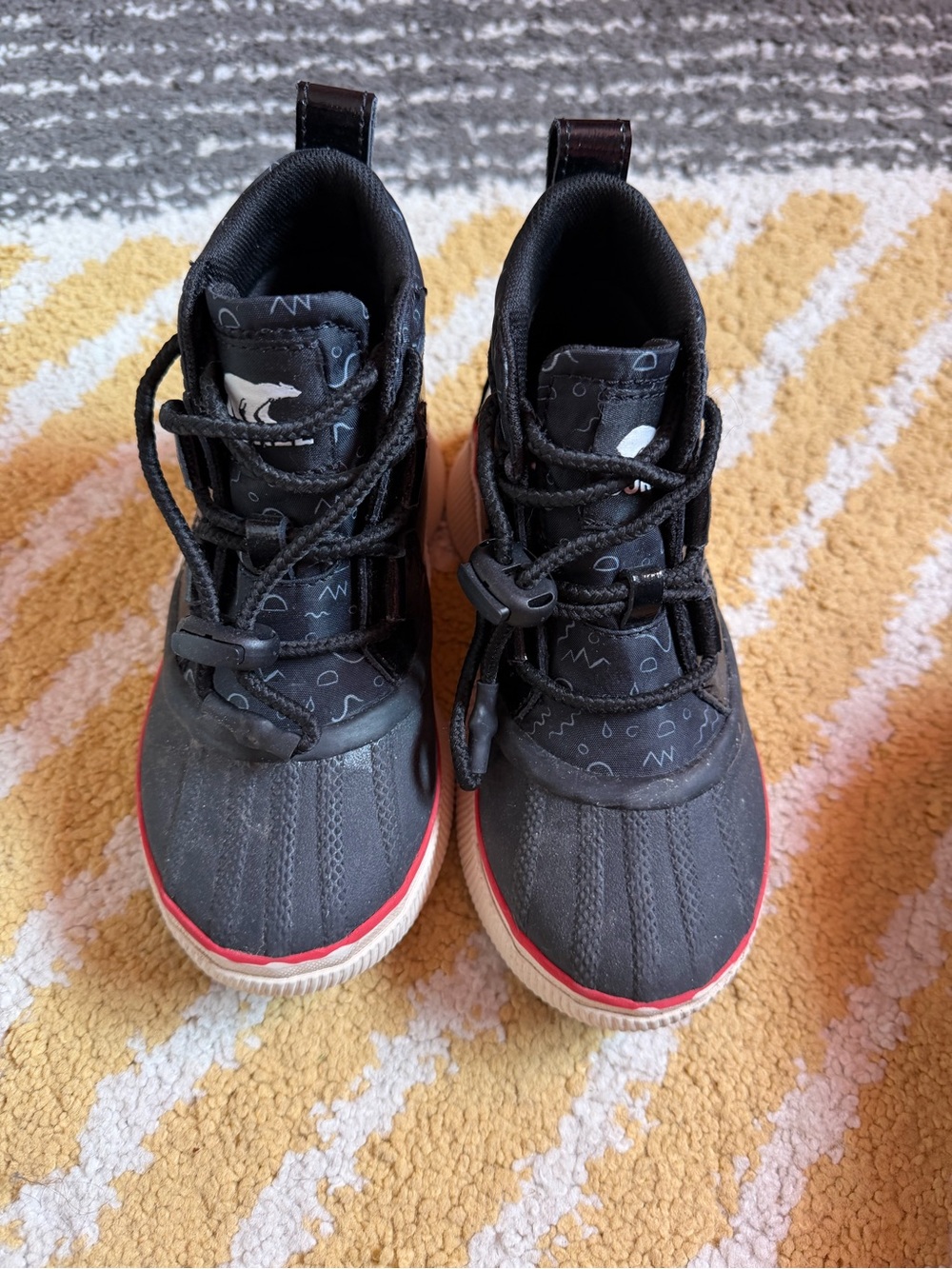 Sorel Kids Black Boots with Red Trim
